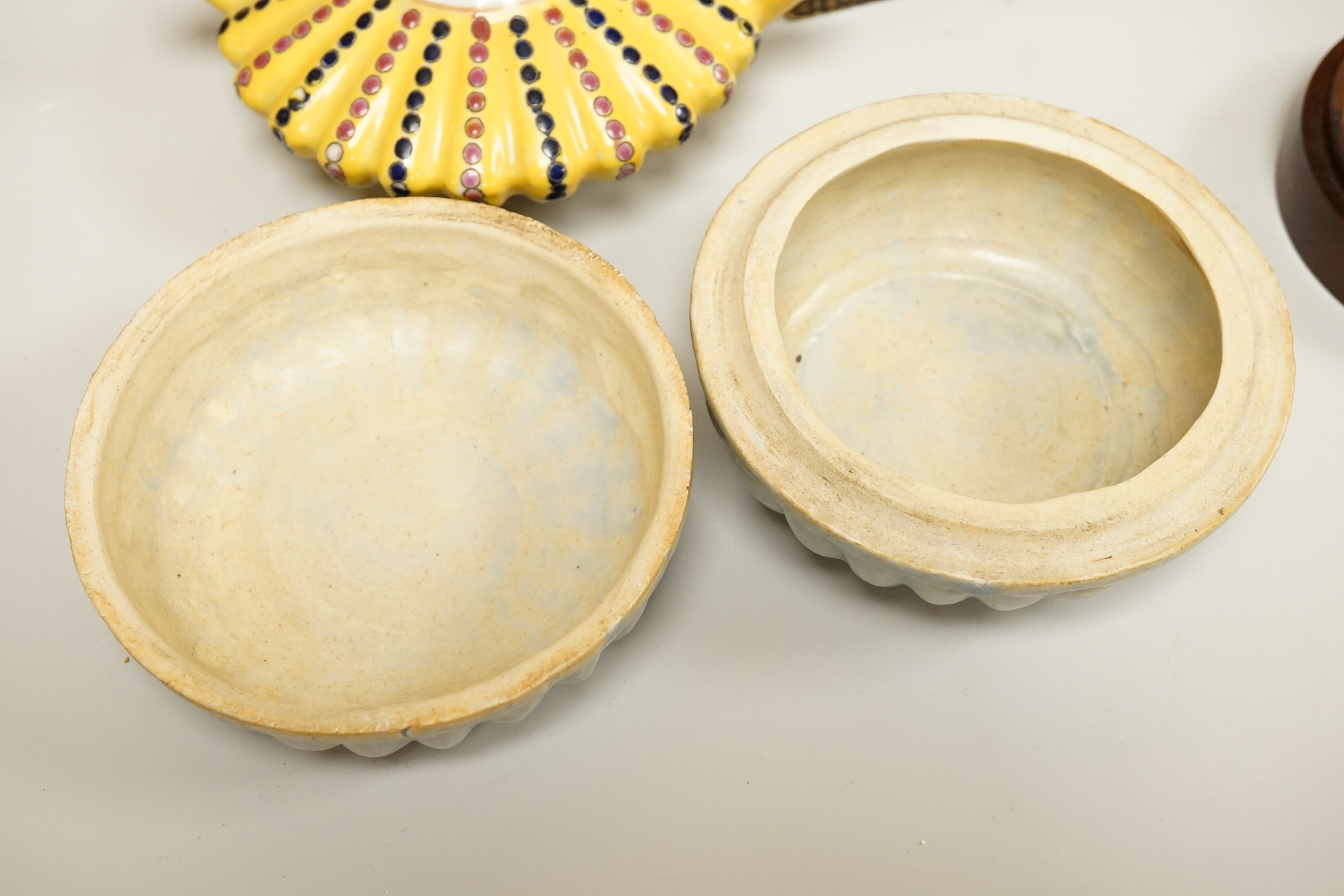 A cased set of semi-precious handled butter knives, two Chinese pottery teapots, a stoneware box and a figure, etc.